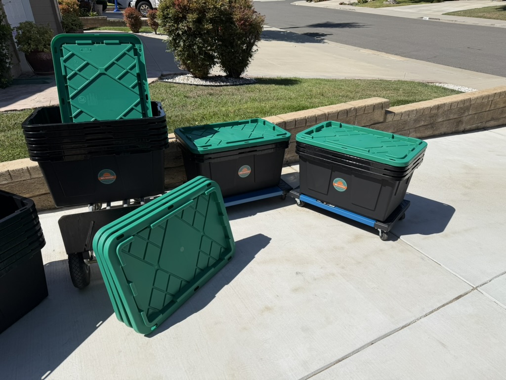 805 Totes moving totes loaded on four-wheel dollies ready to roll inside